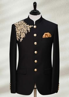 This item is made specially for you by hands with love  Item contains : Coat and pants  Fabrics :   Premium luxury suitings  Colours :  Black Style and Designs :  Suit has mandarin collar and long sleeves with a full button placket symmetrical hem and multiple slits and it has hand embroidery over motif over right front chest pannel which is beautifully made by zardosi and golden materials are used  Trousers come with a mid rise fit and four pockets with fly on the zip and also has a hook and a Luxury Men's Bandhgala With Stand Collar, Luxury Tuxedo Style Bandhgala For Groom, Luxury Formal Long Coat Bandhgala, Luxury Formal Long Bandhgala Coat, Luxury Formal Bandhgala With Suit Collar, Jodhpuri Suits For Men Wedding, Men Wedding Suit, Jodhpuri Suit For Men, Prince Suit