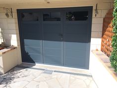 an image of a garage door that is painted blue