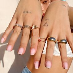 two women with different rings on their fingers