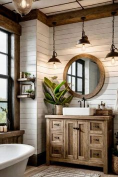 a bathroom with a sink, mirror and bathtub in the middle of it's room