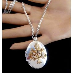 Avon Oak Tree Locket Necklace...Silvertone Setting With Goldtone Tree With Goldtone Oak Leavves And Sparkling Rhinestones..Opens Up To Reveal A Place For A Pic Of Your Loved One...Pendant Locket Is 1 3/4" And Silvertone Chain Is 28" With A 2" Extender...Lobster Clasp....Signed Avon...Also On The Back Of The Locket It Is Engraved Avon My Way...From 2018..In New Condition..Comes In Original Black Box... Please Note That Color May Look Slightly Different On Different Monitors. Silver Locket Necklace For Her, Silver Locket Jewelry For Mother's Day, Mother's Day Silver Locket Jewelry, Silver Metal Jewelry Gift, Silver Locket Necklace Gift For Her, Silver Locket Necklace As Gift For Her, Silver Metal Locket Necklace For Anniversary, Personalized Silver Locket Necklace For Her, Nickel-free Silver Jewelry Gift