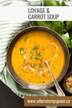 a bowl filled with carrot soup and garnished with parsley on the side