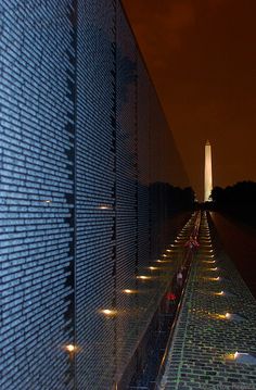 the washington monument and reflecting wall at night