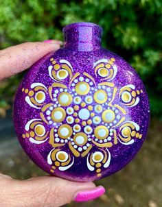 Purple mandala dot Christmas ornament. Painted in white and yellow gold.  I glittered the inside of the ornament with Purple fine glitter. Finished with varnish. Approx 3" round disc shaped plastic ornament but looks like glass. Purple Christmas Ornaments, Purple Mandala, Painted Christmas Ornaments, Purple Christmas, Mandala Dots, Glitter Christmas, Dot Painting, Halloween Shopping, Christmas Ornament