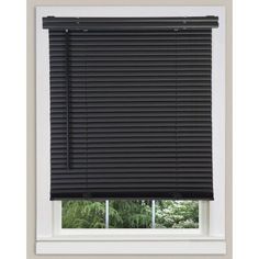 a window with black blinds in it