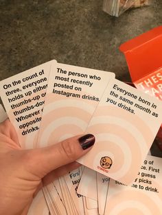 a person holding four cards in their hand with the words, i don't drink