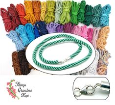 there are many different colors of rope on the white plate and one has a metal hook