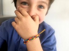 "Colorful child bracelet, kid jewelry. Wood beaded bracelet, simplistic. Gift for baby, for little boy, for him. Handmade in Italy Lovely personalized in colors beaded cord bracelet, toddler boy bracelet.  Choose your favorite colors cord or convo me for different requests.  Hypoallergenic beads and cord bracelet for baby.   For other simplistic beaded bracelet : https://www.etsy.com/listing/512236815/minimalist-men-bracelet-simplistic?ref=shop_home_active_17 take a look to \"gift for men\" sect Creative Macrame, Boy Bracelet, Kid Jewelry, Children Jewelry, Toddler Bracelet, Boys Bracelets, Bracelet Cord, Gold Bracelet Simple, Minimalist Men