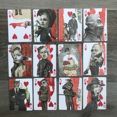 the playing cards have pictures of people in suits and hats, all with hearts on them