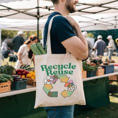 Carry your groceries and essentials in style with this eco-friendly tote bag. Featuring "Recycle Reuse" design, this reusable shopping bag encourages sustainability. Perfect for daily use and a great gift for environmentally conscious friends. This zero waste tote bag is a practical and fashionable addition to your collection. Show your commitment to the environment with this sustainable fashion accessory. Product Features: Printed on Both Sides Fabric: 100% Cotton Canvas | Heavy fabric (12 oz/y Cheap Reusable Canvas Grocery Bag, Reusable Grocery Bag Tote, Cheap Reusable Summer Bags, Customizable Eco-friendly Canvas Bag, Cheap Eco-friendly Canvas Bag For Everyday, Cheap Everyday Reusable Bags, Cheap Reusable Bags For Grocery Shopping, Cheap Reusable Bags For Vacation, Affordable Eco-friendly Canvas Bag With Graphic Print