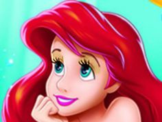 the little mermaid is smiling and looking at the camera with her hand on her chin