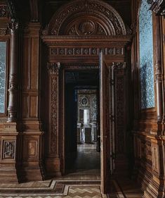 an ornate doorway leading to another room