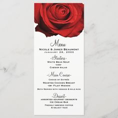 a menu card with a red rose on it