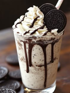 an oreo cookie milkshake with whipped cream and chocolate