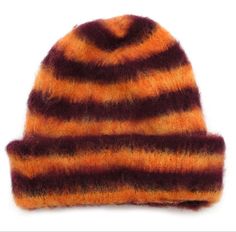 a brown and orange striped hat on a white background