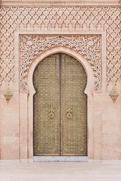 an ornate door with intricate carvings on it