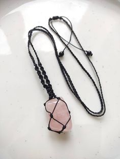 Macrame rose quartz necklace, Crystal necklace, macrame necklace with stone, Gothic gift, Christmas gift Carry your energy and inner peace with you everywhere you go with this beautiful, handcrafted, necklace that has a shiny rose quartz stone caged in macrame polyester cord. Necklace cord is strong and sturdy, wear resistant, not easily deformed, durable for long time use. The necklace has an adjustable sliding knot, meaning it can be shortened or lengthened.  Length: 40cm (15.75in)  The maximu Spiritual Cord Necklaces As Gifts, Adjustable Rose Quartz Crystal Necklace With Natural Stones, Spiritual Cord Jewelry For Gifts, Spiritual Cord Necklaces For Gifts, Spiritual Cord Necklace For Gift, Spiritual Cord Necklace Gift, Bohemian Rose Quartz Crystal Necklace With Natural Stones, Adjustable Rose Quartz Crystal Necklace For Healing, Pink Macrame Jewelry As A Gift