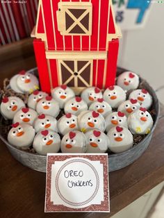 there are many small chickens in the bowl next to a sign that says oreo chickens