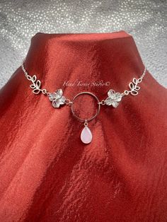 ☽ ༓･.Magical Handmade Moonstone Silver Fairy Choker with Rhodium Flowers.･༓☾ Adjustable Choker or Necklace: Choice of Length Celestial Magic! This adjustable choker will make and enchanting statement!  Delicate and Beautiful!  Designed to Turn Heads! ⋆☽ ༓･.･ ✨P R O D U C T I O N - T I M E ✨ Each pair of my lovingly handcrafted pieces are naturally one of a kind and hand made to order. Please allow 1-3 business days for production. If you have a specific deadline, please let me know and I will do my best to accommodate you! ✨V A R I A T I O N ✨ Please note, each piece is innately unique and your pair may vary slightly from the product photos, but will be just as beautiful!    ✨C A R E - I N S T R U C T I O N S ✨ Each of my creations is hand crafted with love, intention, and meticulous atten Whimsical Sterling Silver Wedding Jewelry, Bohemian Wedding Necklaces With Flower Charm, Fairy Style Adjustable Wedding Jewelry, Ethereal Adjustable Silver Jewelry, Whimsical Adjustable Wedding Jewelry, Whimsical Flower-shaped Wedding Jewelry, Silver Ethereal Jewelry For Party, Adjustable Silver Fairycore Jewelry, Ethereal Silver Jewelry For Parties