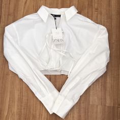 Zara Crop White Shirt Color: White Size: Large Condition: Brand New White Cropped Shirt For Fall, Zara White Collared Top, Chic White Long Sleeve Cropped Shirt, White Cropped Collared Shirt For Spring, Chic White Cropped Shirt, Chic White Collared Cropped Shirt, White Cropped Shirt With Collar For Spring, Chic White Cropped Shirt For Fall, White Long Sleeve Cropped Shirt For Day Out