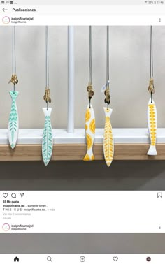 an instagram page with several decorative items hanging from hooks