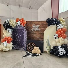 balloons and decorations are arranged on the floor