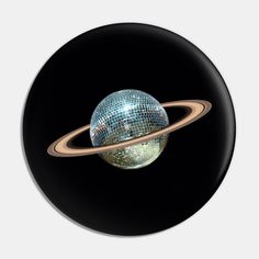 a disco ball with saturn in the center on a black background round ornament