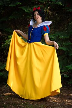 a woman dressed as snow white posing for the camera