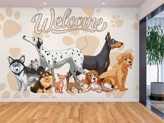 a wall mural with dogs and the word welcome on it