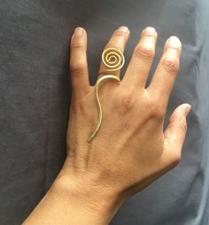 Adjustable handmade spiral statement brass ring. Gift for her Adjustable Spiral Gold Jewelry, Handmade Brass Artsy Jewelry, Handmade Artsy Brass Jewelry, Handmade Brass Toe Ring, Minimalist Spiral Metal Ring Jewelry, Artsy Brass Jewelry For Gifts, Unique Brass Toe Ring Jewelry, Adjustable Bronze Toe Ring, Nickel-free Spiral Brass Jewelry