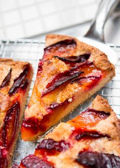 three slices of pie sitting on top of a cooling rack