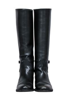 These Bottega Veneta tall riding boots in sleek black leather will make you the "it girl" of the season. Keep your style on point and your feet comfortable with this understated yet powerful choice in footwear. Ready to take on the day, rain or shine! Size 6.5 (IT 36.5) Made in Italy 100% Leather Ankle buckle detail Shaft 16.25" Circumference 14.5" Heel height 1" Tall Riding Boots, Buy Shoes Online, Italian Luxury, Luxury Shop, Touch Up, Bottega Veneta, Riding Boots, Heel Height, Black Leather