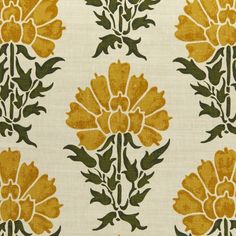 a yellow and green flower pattern on white fabric