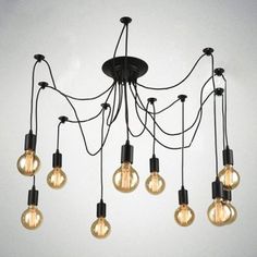 a chandelier with eight light bulbs hanging from it's center and four lights on each side