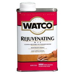 a can of stain that is red and white with the words watco rejuvenating on it