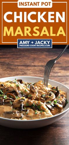 a white plate topped with meat covered in gravy and mushrooms next to a fork