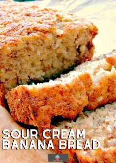 sour cream banana bread on a cutting board with the words sour cream banana bread cut in half