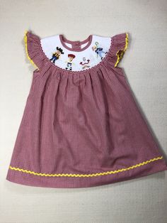 Beautiful hand smocked Toy story bubble Woody, Jessie, Forky, and Bo Peep characters. Bishop Neck, Bo Peep Toy Story, Girls Smocked Dresses, Girls Smock, Hand Smock, Bo Peep, Red Gingham, Smocked Dress, Toy Story