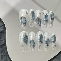 What's included in your order: Set of 10 Press on Nails 1 Application Kit: mini nail filer cuticle pusher 24 nail adhesive tabs Alcohol Prep Pad Custom Size: Choose the custom size option, and don't forget to add measurements of your 10 nails in the note section. The nail set is handmade so they may slightly differ from the image shown. Due to differences in computer monitors, phone displays and tablet displays, the colors of our products may vary slightly. Since it is custom artwork, no returns or exchanges. If you have any problems with your order, please contact us. Gothic Nails Acrylic, Nail Cool, Nails Fancy, Sliver Nails, Star Mirror, Cool Nails, Eight Pointed Star, Hippie Nails, Gothic Nails