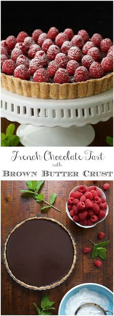 chocolate tart with raspberries and whipped cream in the middle, on a wooden table