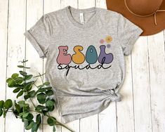 If you're looking for an ESOL teacher shirt for yourself or as an ESOL teacher gift, this shirt is perfect! This ultra soft tee is perfect as an ESOL, ELL, or ESL team shirt - for English Second Language teachers for back to school, teacher appreciation, or year round! ✺ CHECK OUT more shirts/sweatshirts/hoodies/mugs like this in our NURSE/TEACHER/PROFESSION section: https://www.etsy.com/shop/sagicrabboutique?section_id=38694604 ✺  WANT SOMETHING PERSONALIZED OR DON'T SEE THE COLORS YOU WANT?  I Nursing Teacher, Team Shirt, Second Language, Team Shirts, Running Tops, Cotton Lights, Teacher Shirts, Teacher Gift, Teacher Appreciation