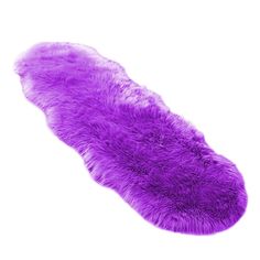 a purple sheepskin rug on a white background