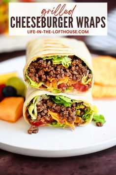 a close up of a burrito on a plate with cheeseburger wraps in the background