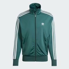 adidas Originals Adicolor Classics Firebird Men's Track Top in Dark Green This product data sheet is originally written in English.           MENU Visit Our Shop Check Our Feedback Items for sale Contact Us description adidas Originals Adicolor Firebird Track Top SPECIFICATIONS 100% Recycled Polyester Tricot Full Zip Stand-up Collar Zippered Pocketsin Mineral Green Color  100% Authentic and Brand New Delivery All items are shipped using Royal Mail Tracked 48 unless stated otherwise on listing within the UK. We post world wide, some countries are priced individually please contact us for quote if you cannot see a set price for your country. Parcels sent Internationally can take anywhere from 4 days to 4 weeks. This is depending on the countries Customs Office if they select to do a random s Fashion Motivation, Luxury Gym, Mineral Green, Adidas Adicolor, Adidas Original, Adidas Originals Mens, Original Fashion, Striped Jacket, Brand Store