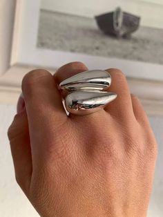 "Set of Statement Rings, Chunky Dome Ring, Sterling Silver, Cocktail Ring, Tear Rilver Ring, Geometric Ring, Set of Dome Ring, Modern Ring Μodern sets of two statement rings are worn either alone or together they are made of 950 silver, you can send me a message for variation if you want it in matte one and glossy the other, or in two glossy the choice is yours ✔~ 100% Handmade ~ ✔~ 100% 925 Sterling Silver ~ ✔~ Height 12.0 MM ~ \"the upper part\" ~ ✔~ Width 13.0 MM ~ \"the upper part\" ~ ✔~ Len Bulky Silver Rings, Big Silver Rings, Thick Silver Rings Chunky, Silver Chunky Rings, Chunky Silver Rings Minimalist, Chunky Silver Jewellery Big Rings, Chunky Silver Rings Bohemian, Rings Chunky, Chunky Silver Jewellery