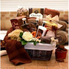 a gift basket filled with chocolates, cookies and other items for someone's special occasion