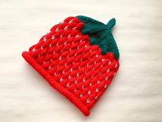 This strawberry hat is completely handmade in Sweden using high-quality yarns. It is a great winter accessory as well as a super cute birthday present.  We especially preferred to work with acrylic for this hat as acrylic is synthetic and will not irritate someone who has sensitivity to wool or animal-based products.  Acrylic headwear keeps its shape, holds its color, and is resistant to stains and wrinkles. You can put this hat to washer in sensitive program. We offer different sizes, please re Knitted Strawberry, Fruit Hat, Strawberry Hat, Hat For Kids, Cute Birthday, Thank You For Purchasing, Knitting For Kids, Paper Tags, Small Detail