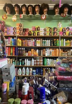 the shelves are filled with different types of hair products