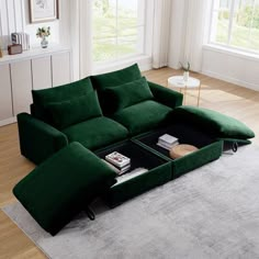 a living room with a green couch and coffee table on the rug in front of it