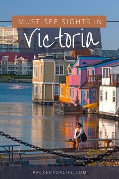 a woman sitting on the dock in front of colorful houses with text overlay that reads must see sights in victoria